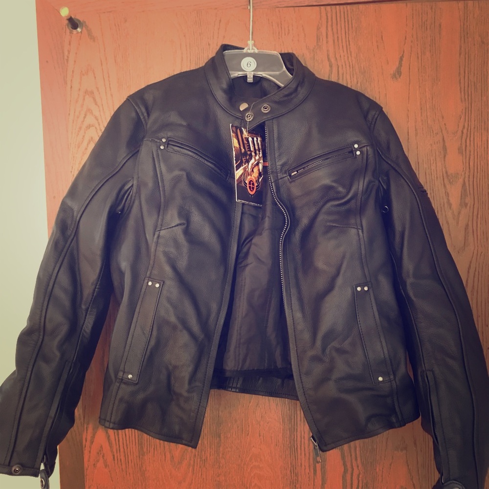 Women’s motorcycle leather jacket. Size medium